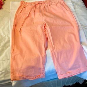 Peach Calf-length shorts.